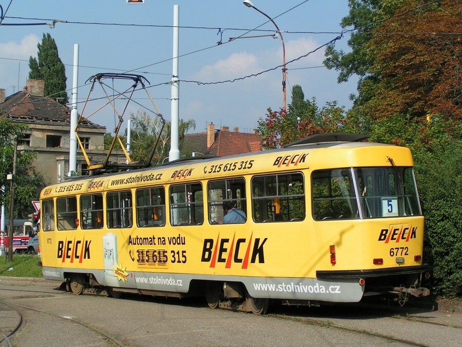 6772