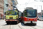9077