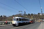 7025