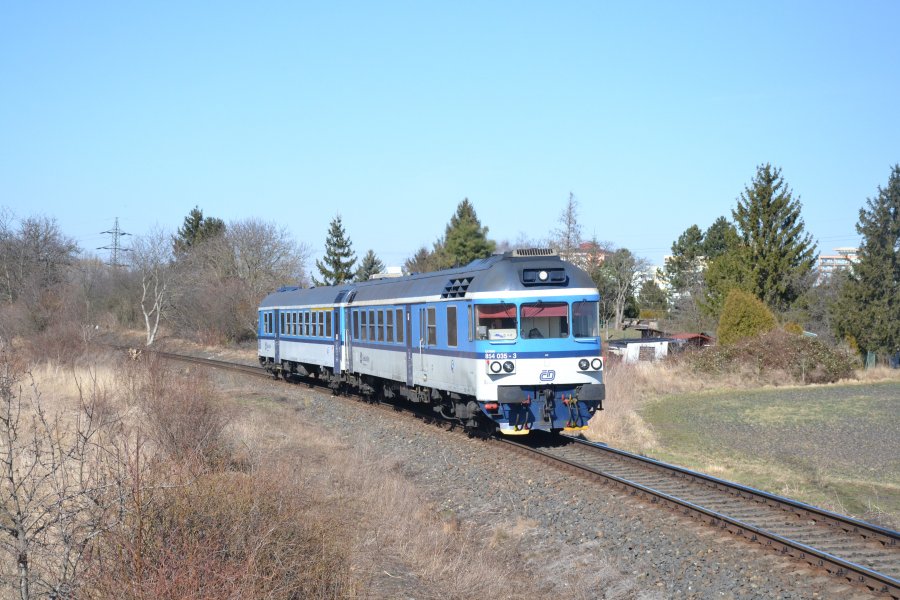 854.035