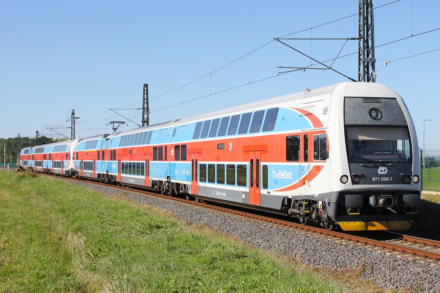 971 056-7
